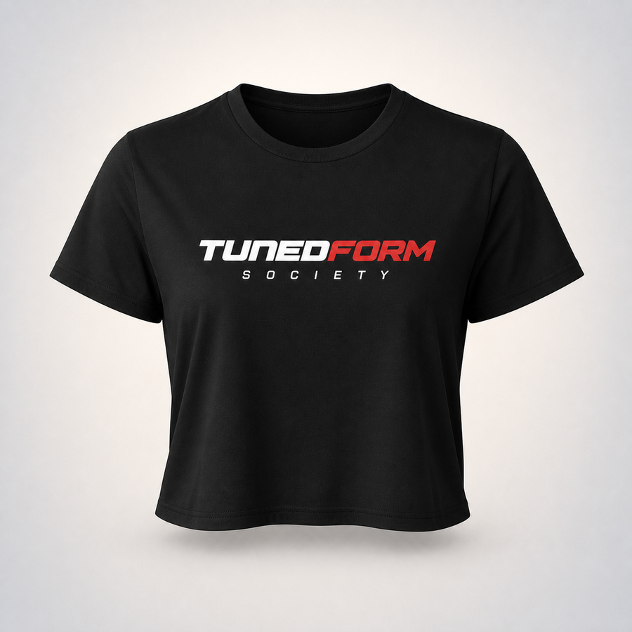 TF-023 Women's Flowy Crop Tee on the TunedForm studio gradient