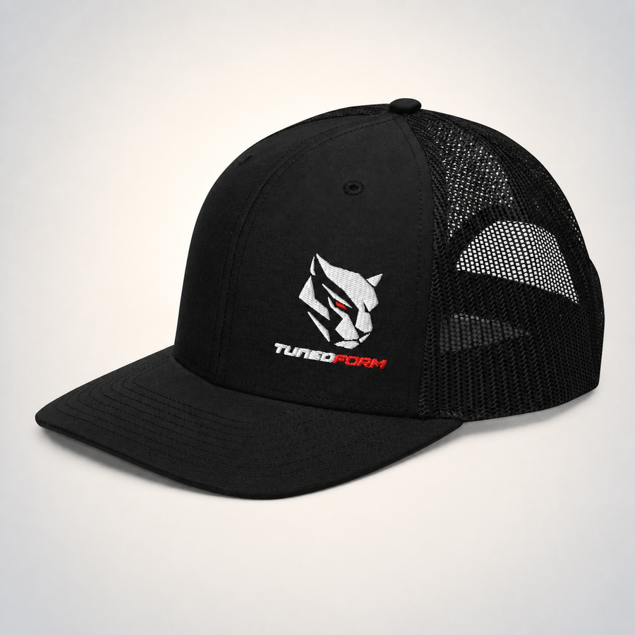 TunedForm Panther Trucker Cap on the TunedForm studio gradient